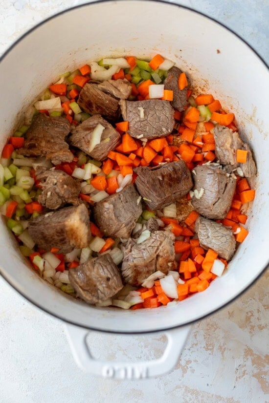 beef and vegetables in a pot