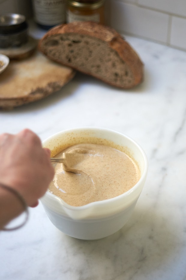 rye crepe batter in a white bowl