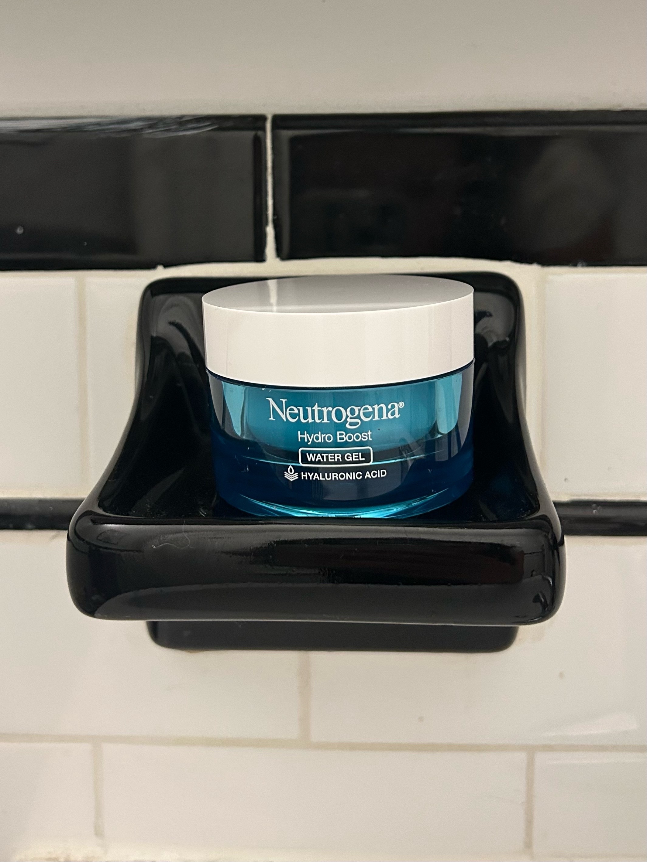 Image of the Neutrogena Hydro Boost Water Gel sitting on a shelf in Alyssa Brascia's bathroom.