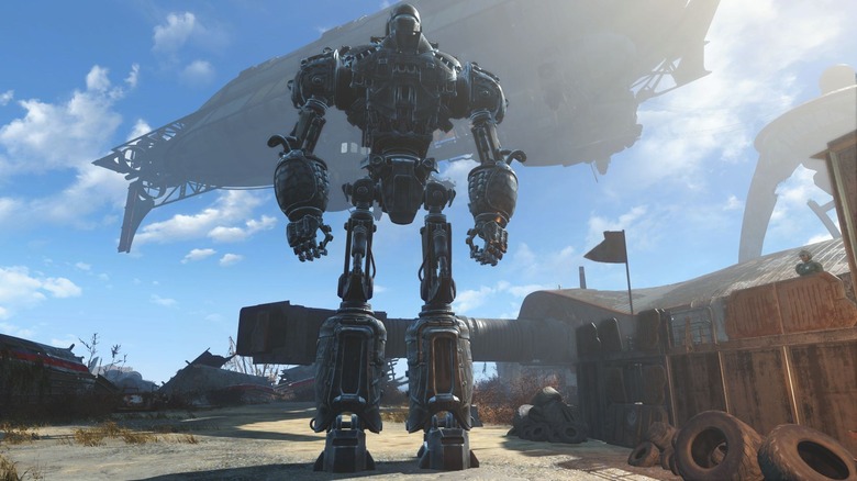 Liberty Prime patrolling a compound with the Prydwen floating behind it on Fallout 4